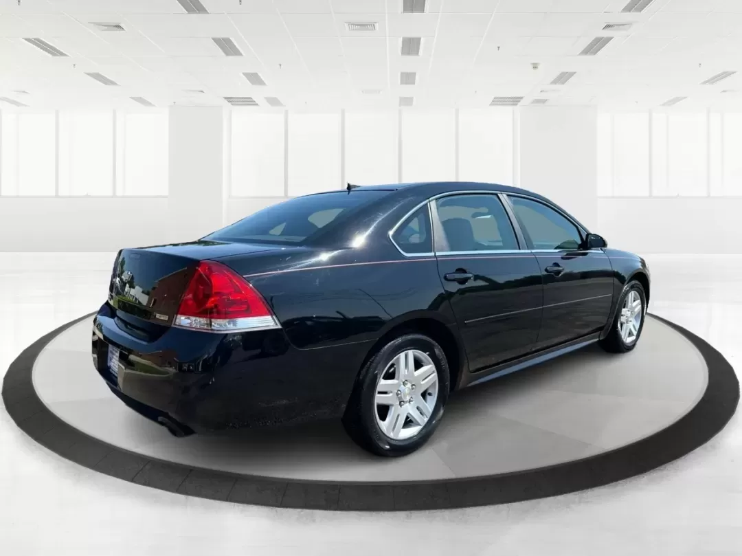 2014 Chevrolet Impala Limited LT (2G1WB5E3XE1) with an 3.6L V-6 gasoline direct injection engine, located at 1230 East Main St, Xenia, OH, 45385, (937) 908-9800, 39.688026, -83.910172 - Are you ready for your next adventure, whether it's a family road trip, a daily commute, or simply running errands around Fairborn? The 2014 Chevrolet Impala Limited LT is the perfect sedan to elevate your driving experience. With its stylish black exterior and reliable performance, this vehicle is - Photo#2
