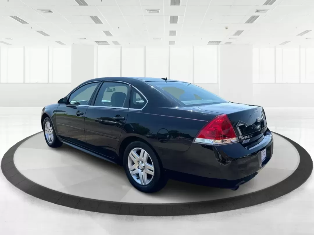 2014 Chevrolet Impala Limited LT (2G1WB5E3XE1) with an 3.6L V-6 gasoline direct injection engine, located at 1230 East Main St, Xenia, OH, 45385, (937) 908-9800, 39.688026, -83.910172 - Are you ready for your next adventure, whether it's a family road trip, a daily commute, or simply running errands around Fairborn? The 2014 Chevrolet Impala Limited LT is the perfect sedan to elevate your driving experience. With its stylish black exterior and reliable performance, this vehicle is - Photo#4