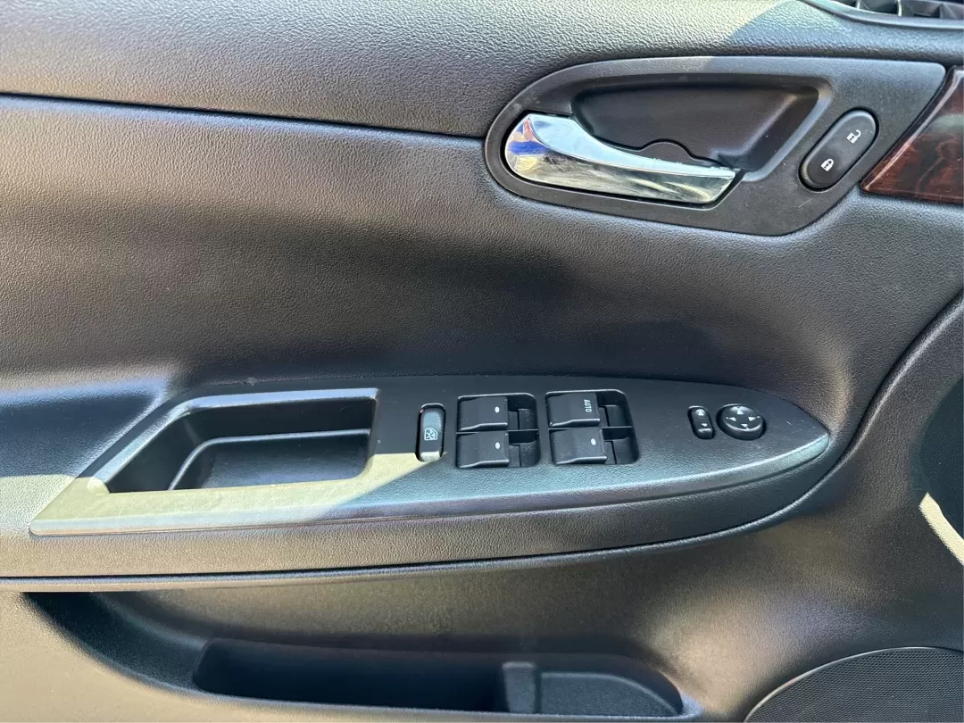 2014 Chevrolet Impala Limited LT (2G1WB5E3XE1) with an 3.6L V-6 gasoline direct injection engine, located at 1230 East Main St, Xenia, OH, 45385, (937) 908-9800, 39.688026, -83.910172 - Are you ready for your next adventure, whether it's a family road trip, a daily commute, or simply running errands around Fairborn? The 2014 Chevrolet Impala Limited LT is the perfect sedan to elevate your driving experience. With its stylish black exterior and reliable performance, this vehicle is - Photo#19