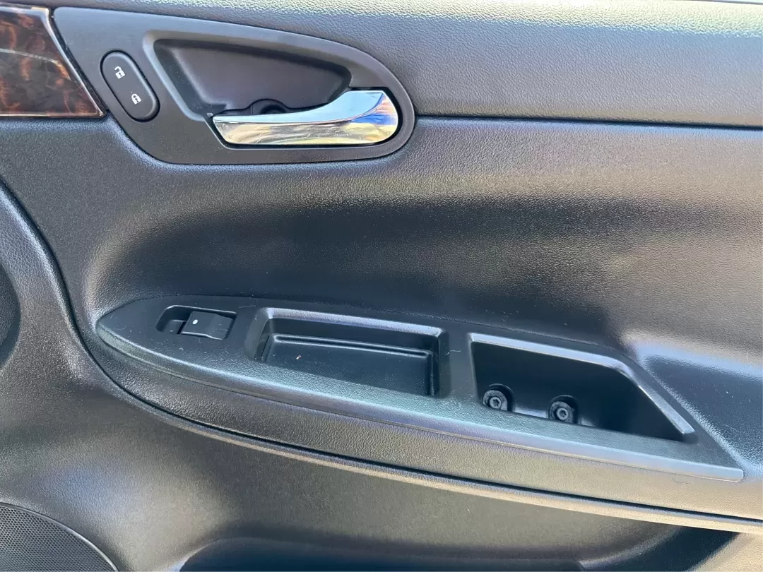 2014 Chevrolet Impala Limited LT (2G1WB5E3XE1) with an 3.6L V-6 gasoline direct injection engine, located at 1230 East Main St, Xenia, OH, 45385, (937) 908-9800, 39.688026, -83.910172 - Are you ready for your next adventure, whether it's a family road trip, a daily commute, or simply running errands around Fairborn? The 2014 Chevrolet Impala Limited LT is the perfect sedan to elevate your driving experience. With its stylish black exterior and reliable performance, this vehicle is - Photo#20