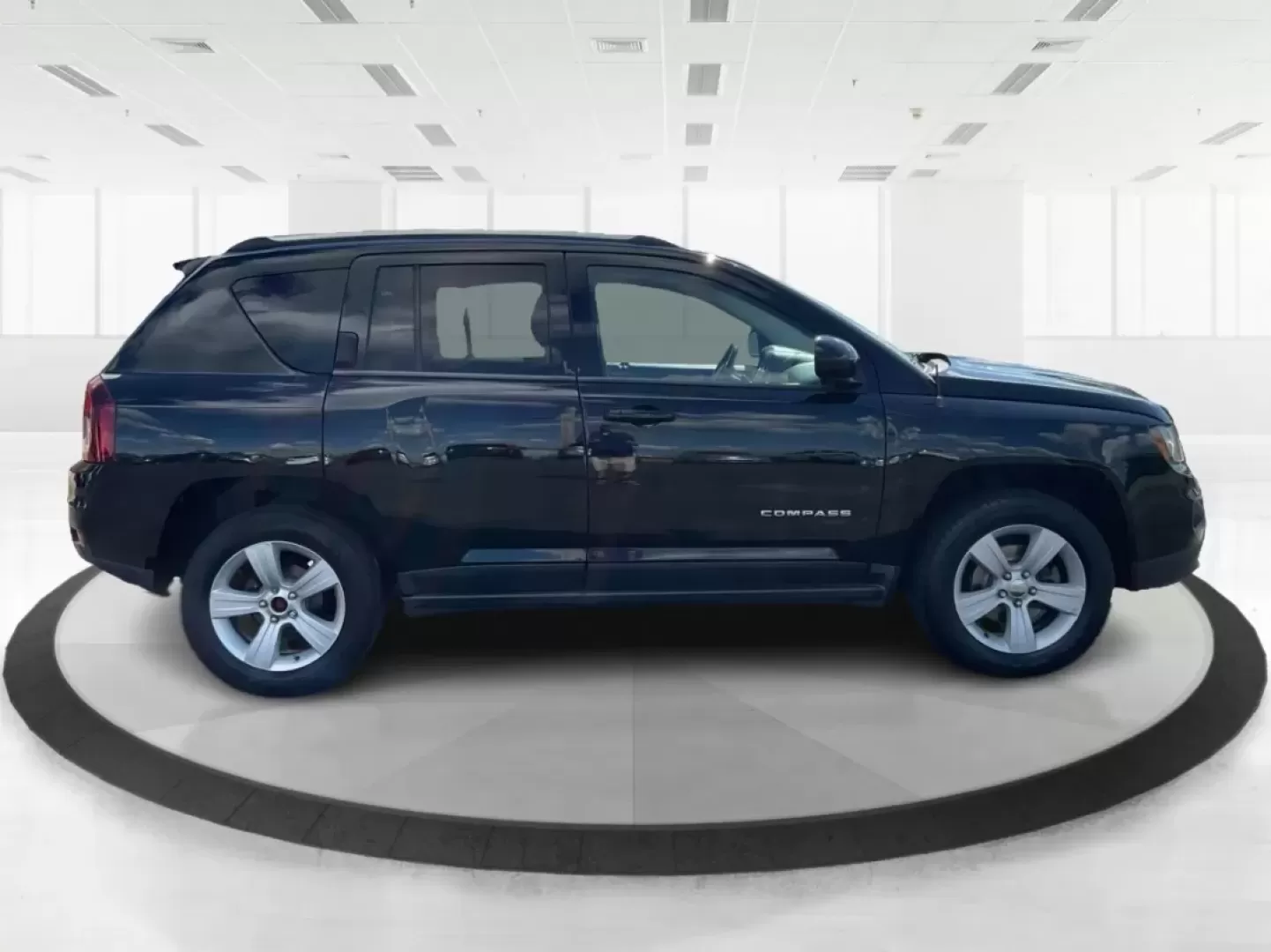 2014 Jeep Compass Latitude 4WD (1C4NJDEB8ED) with an 2.4L L4 DOHC 16V engine, Continuously Variable Transmission transmission, located at 880 E. National Road, Vandalia, OH, 45377, (937) 908-9800, 39.891918, -84.183594 - **Unleash Your Adventurous Spirit with the 2014 Jeep Compass Latitude 4WD!** <br /> <br /> Are you ready to elevate your weekend getaways or daily commutes? Look no further than the stunning 2014 Jeep Compass Latitude 4WD available at Advantage Car and Credit in Vandalia, OH! This rugged yet stylish - Photo#1