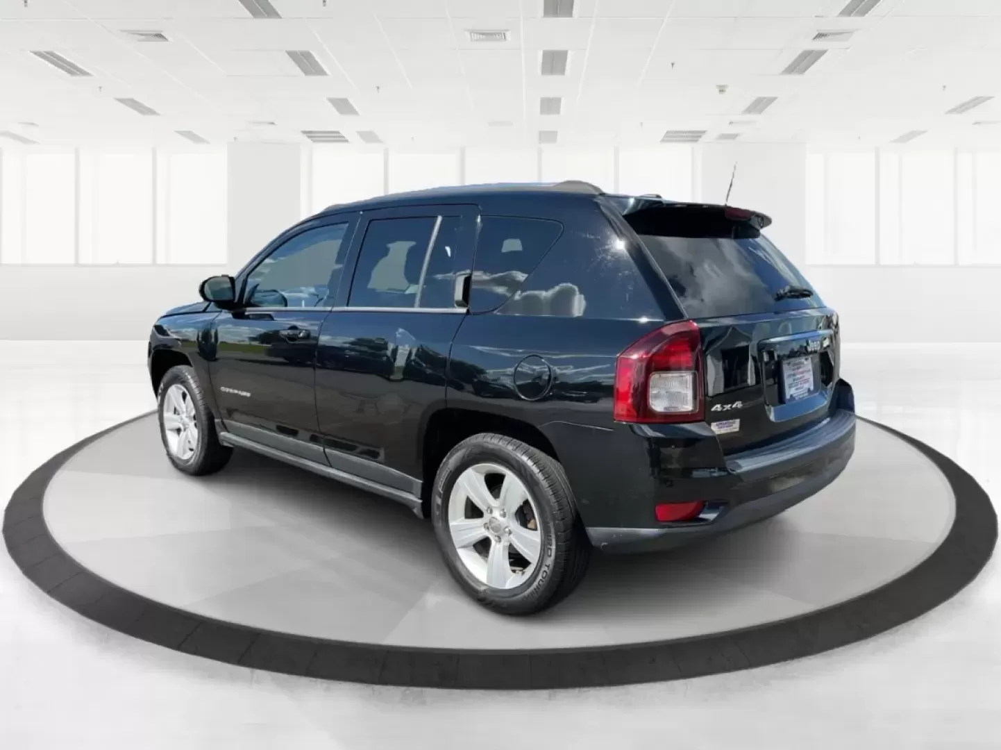 2014 Jeep Compass Latitude 4WD (1C4NJDEB8ED) with an 2.4L L4 DOHC 16V engine, Continuously Variable Transmission transmission, located at 880 E. National Road, Vandalia, OH, 45377, (937) 908-9800, 39.891918, -84.183594 - **Unleash Your Adventurous Spirit with the 2014 Jeep Compass Latitude 4WD!** <br /> <br /> Are you ready to elevate your weekend getaways or daily commutes? Look no further than the stunning 2014 Jeep Compass Latitude 4WD available at Advantage Car and Credit in Vandalia, OH! This rugged yet stylish - Photo#4