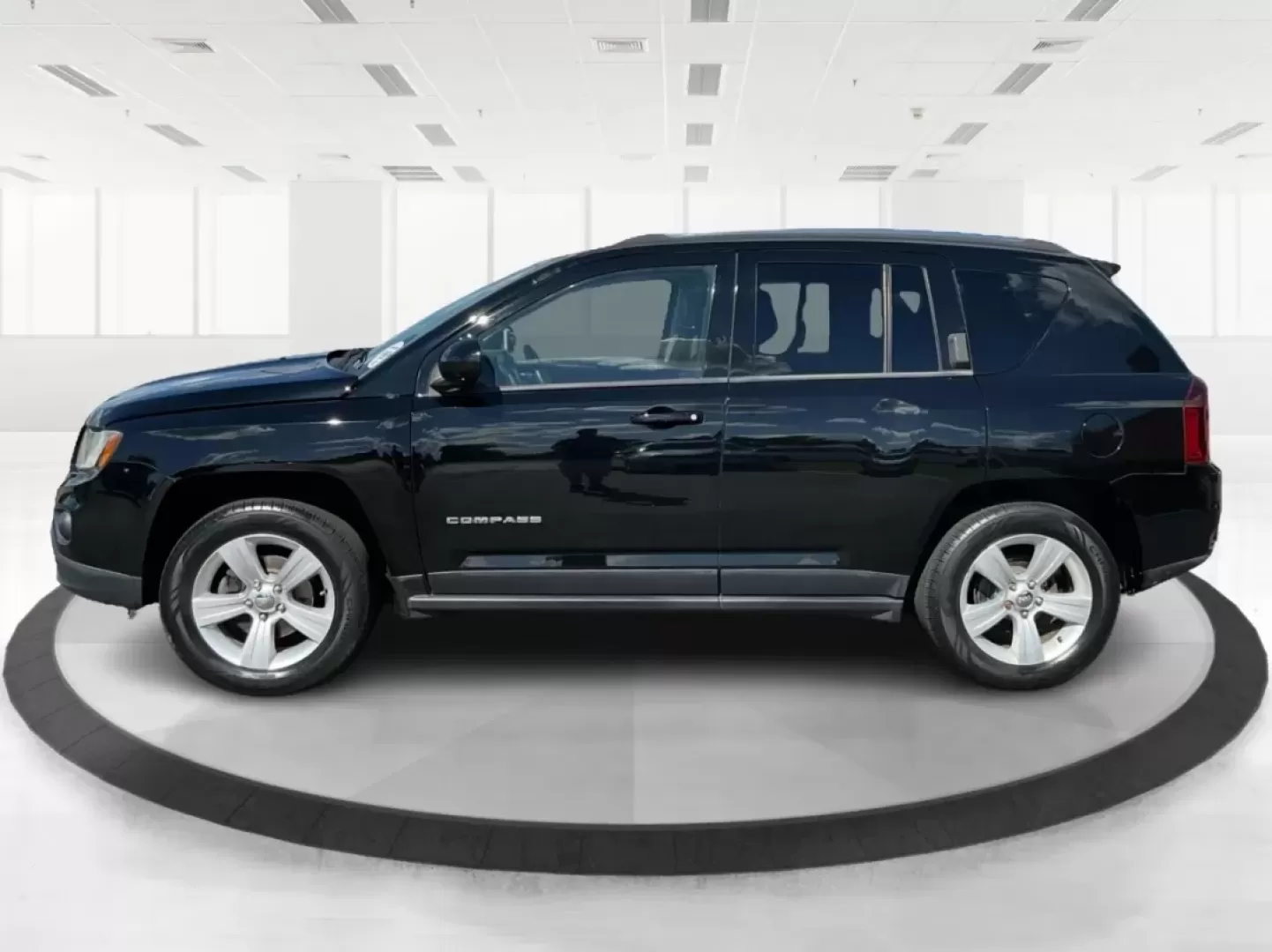 2014 Jeep Compass Latitude 4WD (1C4NJDEB8ED) with an 2.4L L4 DOHC 16V engine, Continuously Variable Transmission transmission, located at 880 E. National Road, Vandalia, OH, 45377, (937) 908-9800, 39.891918, -84.183594 - **Unleash Your Adventurous Spirit with the 2014 Jeep Compass Latitude 4WD!** <br /> <br /> Are you ready to elevate your weekend getaways or daily commutes? Look no further than the stunning 2014 Jeep Compass Latitude 4WD available at Advantage Car and Credit in Vandalia, OH! This rugged yet stylish - Photo#5