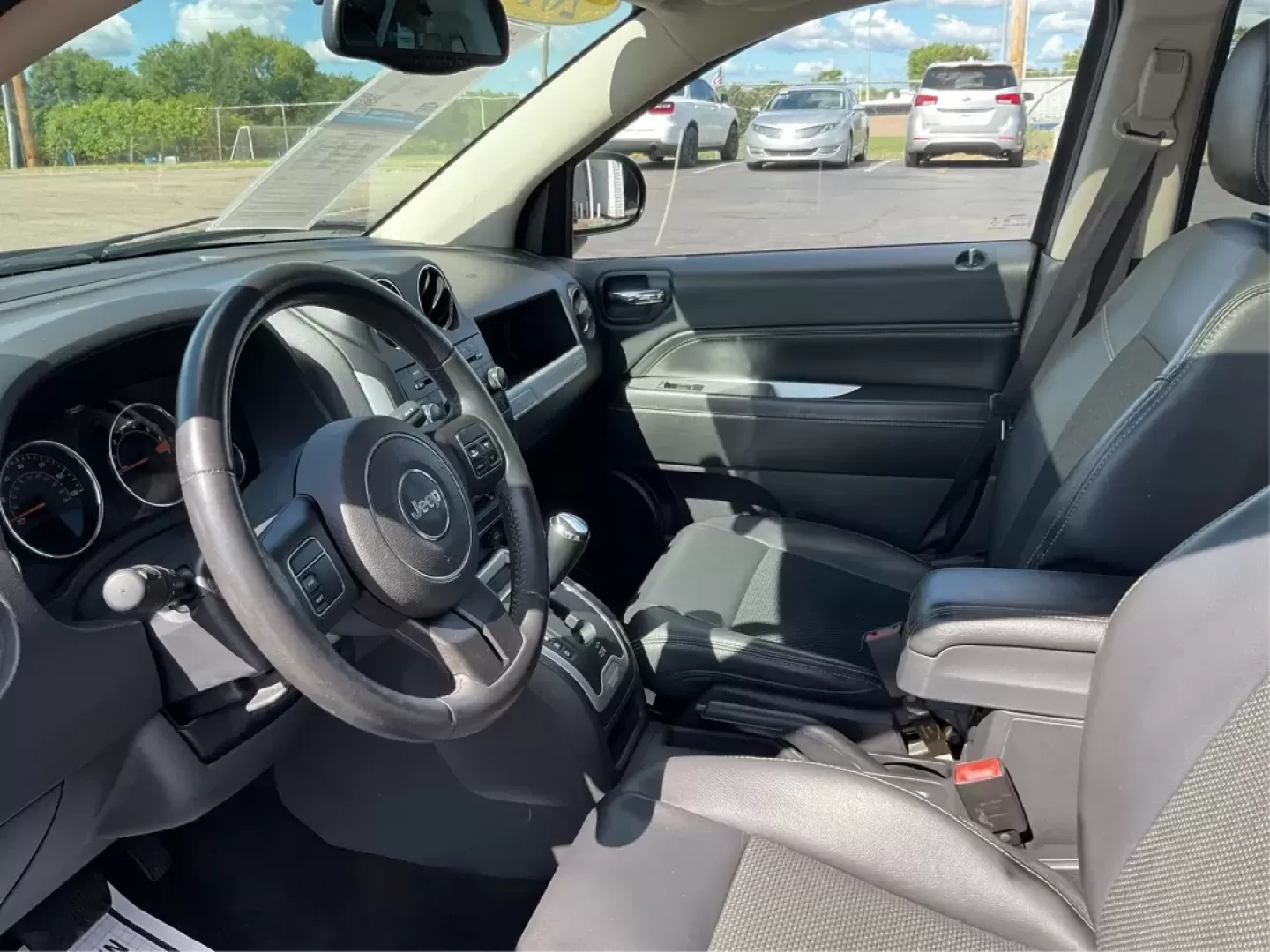 2014 Jeep Compass Latitude 4WD (1C4NJDEB8ED) with an 2.4L L4 DOHC 16V engine, Continuously Variable Transmission transmission, located at 880 E. National Road, Vandalia, OH, 45377, (937) 908-9800, 39.891918, -84.183594 - **Unleash Your Adventurous Spirit with the 2014 Jeep Compass Latitude 4WD!** <br /> <br /> Are you ready to elevate your weekend getaways or daily commutes? Look no further than the stunning 2014 Jeep Compass Latitude 4WD available at Advantage Car and Credit in Vandalia, OH! This rugged yet stylish - Photo#9
