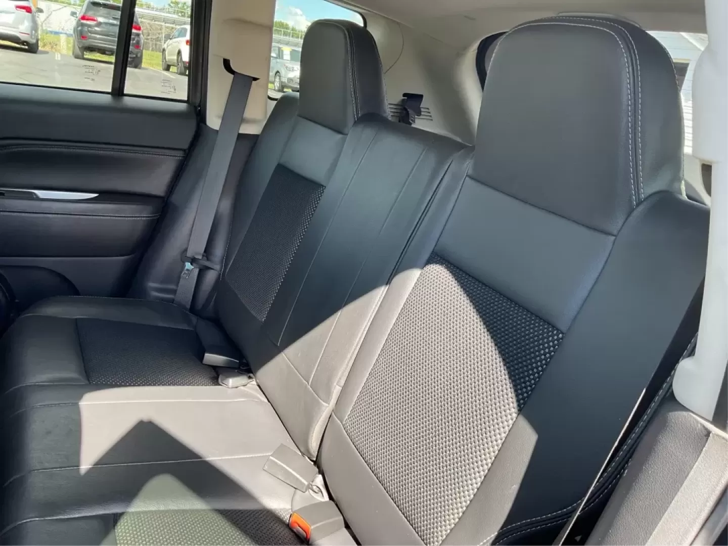 2014 Jeep Compass Latitude 4WD (1C4NJDEB8ED) with an 2.4L L4 DOHC 16V engine, Continuously Variable Transmission transmission, located at 880 E. National Road, Vandalia, OH, 45377, (937) 908-9800, 39.891918, -84.183594 - **Unleash Your Adventurous Spirit with the 2014 Jeep Compass Latitude 4WD!** <br /> <br /> Are you ready to elevate your weekend getaways or daily commutes? Look no further than the stunning 2014 Jeep Compass Latitude 4WD available at Advantage Car and Credit in Vandalia, OH! This rugged yet stylish - Photo#10