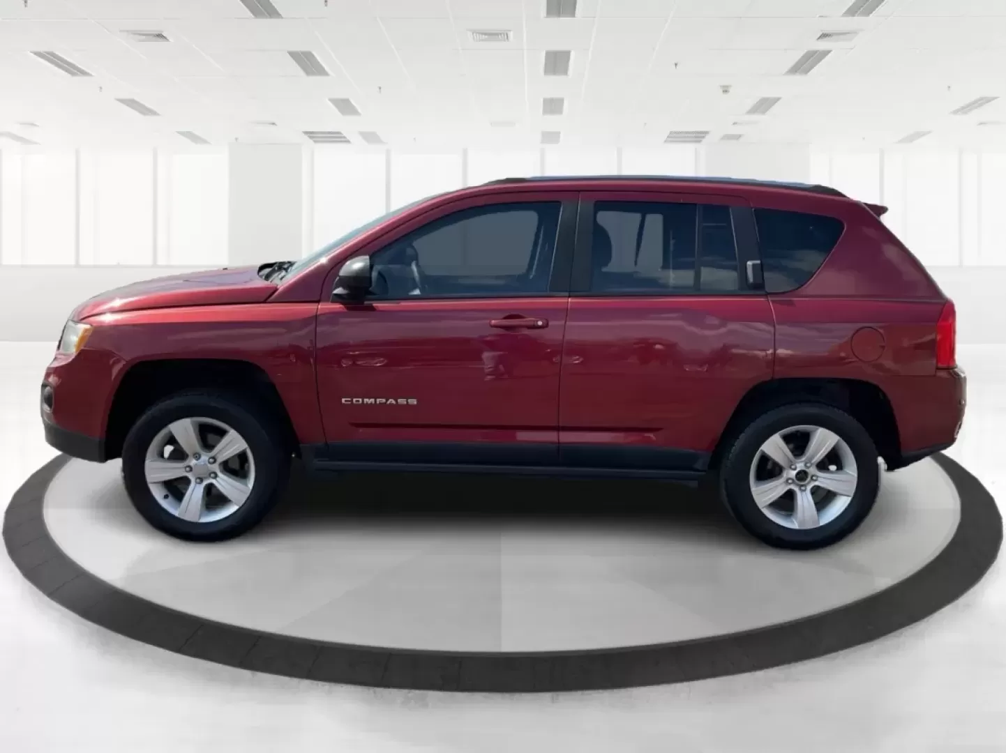 2013 Jeep Compass Latitude (1C4NJDEB6DD) with an 2.4L I-4 DOHC engine, located at 8750 N County Rd 25A, Piqua, OH, 45356, (937) 908-9800, 40.164391, -84.232513 - Are you ready to elevate your adventures and embrace a lifestyle filled with exploration? The 2013 Jeep Compass Latitude is the perfect companion for those who value versatility and comfort, making it an ideal choice for weekend getaways or daily commutes. This rugged yet refined SUV is now availabl - Photo#4