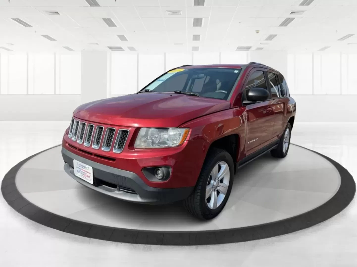 2013 Jeep Compass Latitude (1C4NJDEB6DD) with an 2.4L I-4 DOHC engine, located at 8750 N County Rd 25A, Piqua, OH, 45356, (937) 908-9800, 40.164391, -84.232513 - Are you ready to elevate your adventures and embrace a lifestyle filled with exploration? The 2013 Jeep Compass Latitude is the perfect companion for those who value versatility and comfort, making it an ideal choice for weekend getaways or daily commutes. This rugged yet refined SUV is now availabl - Photo#7
