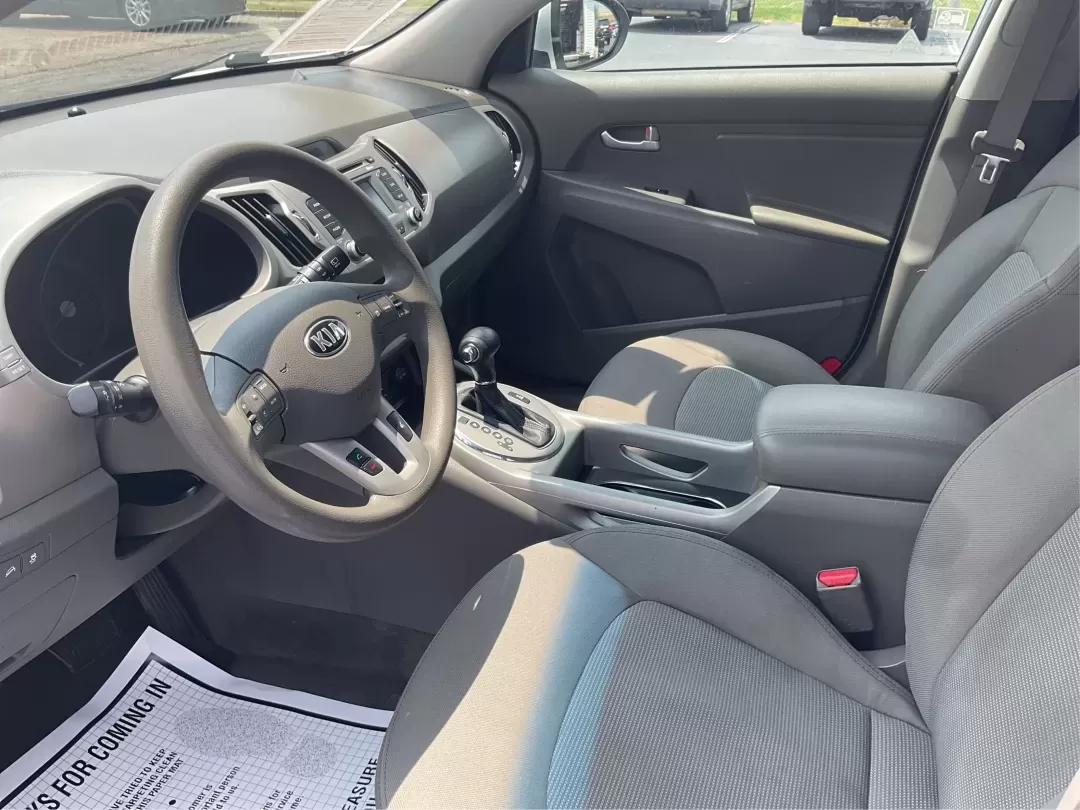 2016 Kia Sportage LX (KNDPBCACXG7) with an Theta II 2.4L I-4 gasoline direct injection engine, located at 1230 East Main St, Xenia, OH, 45385, (937) 908-9800, 39.688026, -83.910172 - Embrace the journey of life with the 2016 Kia Sportage LX, a vehicle designed for those who thrive on adventure and seek comfort in their daily commute. Whether you're navigating the bustling streets of Fairborn, OH, or embarking on a weekend family getaway, this versatile crossover is your perfect - Photo#9