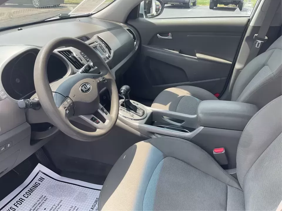 2016 Kia Sportage LX (KNDPBCACXG7) with an Theta II 2.4L I-4 gasoline direct injection engine, 6-Speed Automatic transmission, located at 1230 East Main St, Xenia, OH, 45385, (937) 908-9800, 39.688026, -83.910172 - Embrace the journey of life with the 2016 Kia Sportage LX, a vehicle designed for those who thrive on adventure and seek comfort in their daily commute. Whether you're navigating the bustling streets of Fairborn, OH, or embarking on a weekend family getaway, this versatile crossover is your perfect - Photo#9