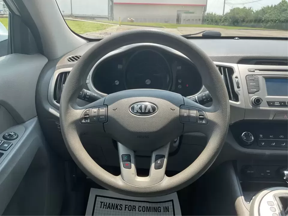 2016 Kia Sportage LX (KNDPBCACXG7) with an Theta II 2.4L I-4 gasoline direct injection engine, 6-Speed Automatic transmission, located at 1230 East Main St, Xenia, OH, 45385, (937) 908-9800, 39.688026, -83.910172 - Embrace the journey of life with the 2016 Kia Sportage LX, a vehicle designed for those who thrive on adventure and seek comfort in their daily commute. Whether you're navigating the bustling streets of Fairborn, OH, or embarking on a weekend family getaway, this versatile crossover is your perfect - Photo#16