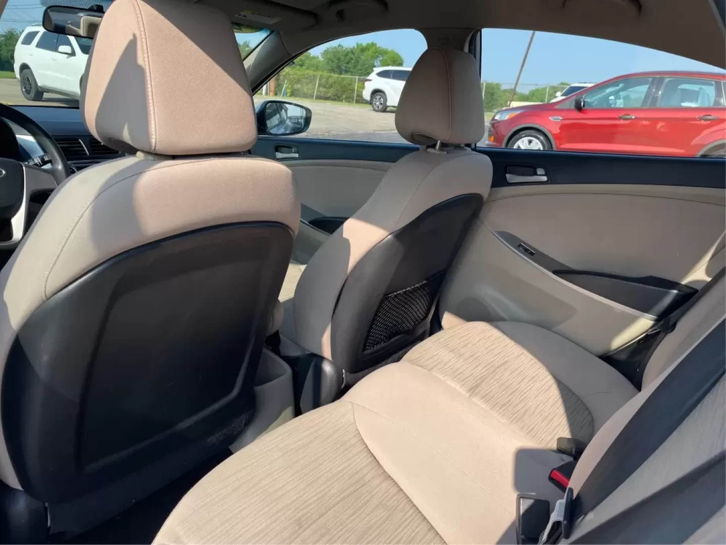 2017 Hyundai Accent SE 4-Door 6A (KMHCT4AE7HU) with an 1.6L L4 DOHC 16V engine, 6-Speed Automatic transmission, located at 8750 N County Rd 25A, Piqua, OH, 45356, (937) 908-9800, 40.164391, -84.232513 - Are you searching for a reliable, budget-friendly vehicle that accommodates your busy lifestyle? Look no further than Advantage Car and Credit in Fairborn, OH! We specialize in providing top-notch used vehicles with flexible financing options tailored to fit your needs. Our 2017 Hyundai Accent SE is - Photo#10