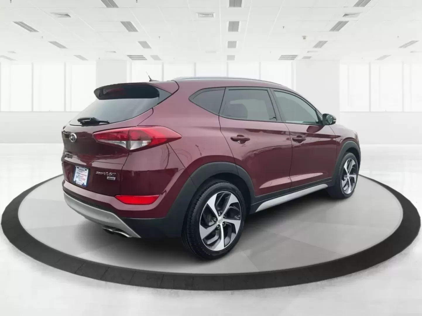 2017 Hyundai Tucson Sport (KM8J3CA29HU) with an 1.6L I-4 gasoline direct injection engine, located at 1951 S Dayton Lakeview Rd., New Carlisle, OH, 45344, (937) 908-9800, 39.890999, -84.050255 - **Discover Adventure in the 2017 Hyundai Tucson: Your Ideal SUV for Every Journey!**<br /> <br /> Are you ready to elevate your driving experience? The 2017 Hyundai Tucson in striking Ruby Wine is here, tailored for those who crave versatility and reliability in their daily adventures. Whether you'r - Photo#2