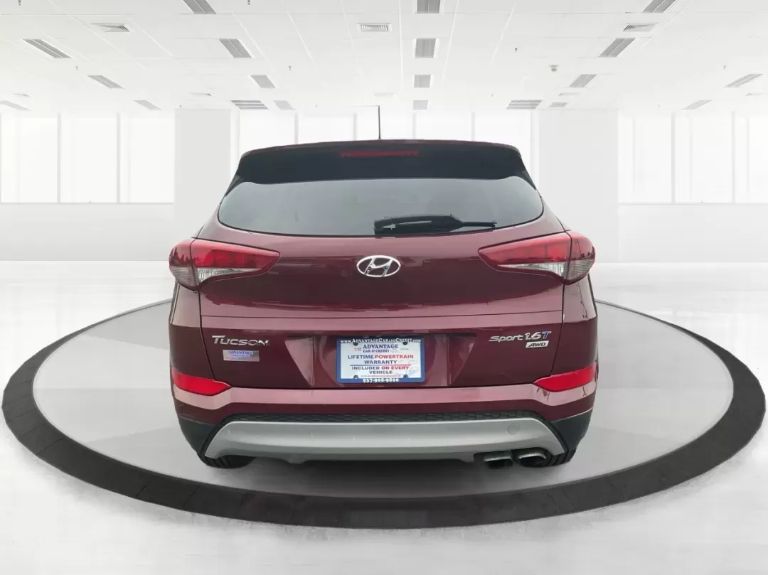 2017 Hyundai Tucson Sport (KM8J3CA29HU) with an 1.6L I-4 gasoline direct injection engine, located at 1951 S Dayton Lakeview Rd., New Carlisle, OH, 45344, (937) 908-9800, 39.890999, -84.050255 - **Discover Adventure in the 2017 Hyundai Tucson: Your Ideal SUV for Every Journey!**<br /> <br /> Are you ready to elevate your driving experience? The 2017 Hyundai Tucson in striking Ruby Wine is here, tailored for those who crave versatility and reliability in their daily adventures. Whether you'r - Photo#3