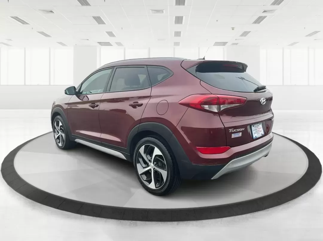 2017 Hyundai Tucson Sport (KM8J3CA29HU) with an 1.6L I-4 gasoline direct injection engine, located at 1951 S Dayton Lakeview Rd., New Carlisle, OH, 45344, (937) 908-9800, 39.890999, -84.050255 - **Discover Adventure in the 2017 Hyundai Tucson: Your Ideal SUV for Every Journey!**<br /> <br /> Are you ready to elevate your driving experience? The 2017 Hyundai Tucson in striking Ruby Wine is here, tailored for those who crave versatility and reliability in their daily adventures. Whether you'r - Photo#4