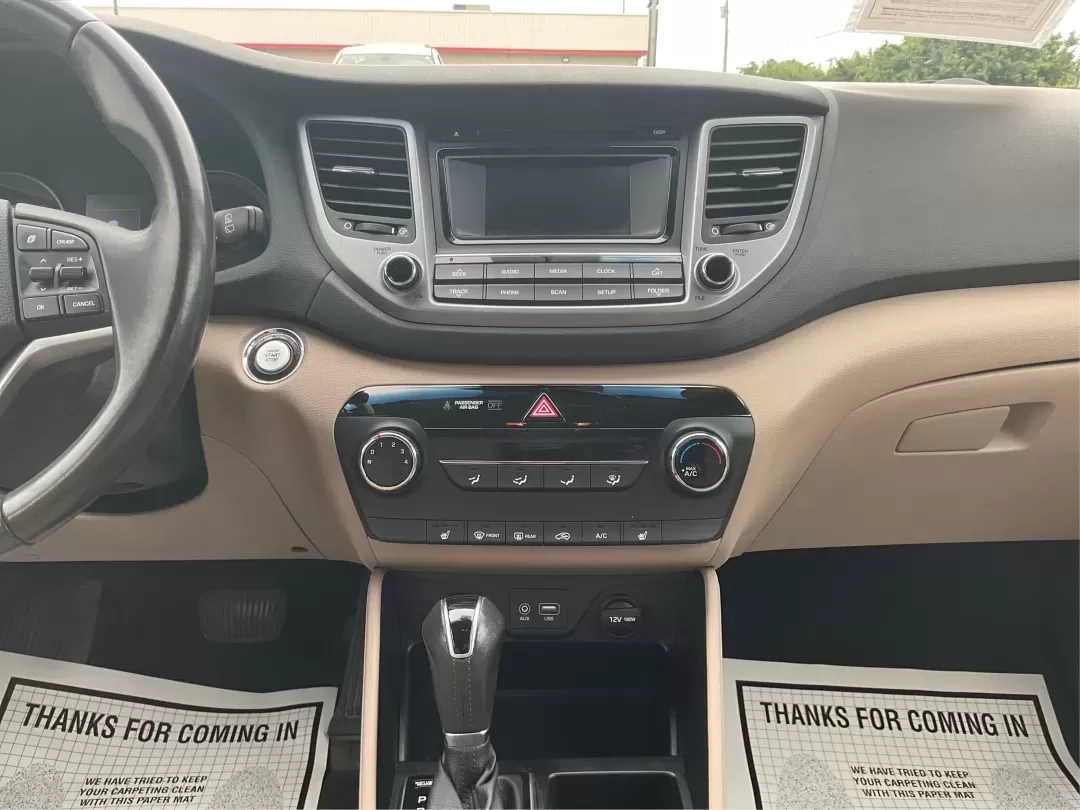 2017 Hyundai Tucson Sport (KM8J3CA29HU) with an 1.6L I-4 gasoline direct injection engine, located at 1951 S Dayton Lakeview Rd., New Carlisle, OH, 45344, (937) 908-9800, 39.890999, -84.050255 - **Discover Adventure in the 2017 Hyundai Tucson: Your Ideal SUV for Every Journey!**<br /> <br /> Are you ready to elevate your driving experience? The 2017 Hyundai Tucson in striking Ruby Wine is here, tailored for those who crave versatility and reliability in their daily adventures. Whether you'r - Photo#13