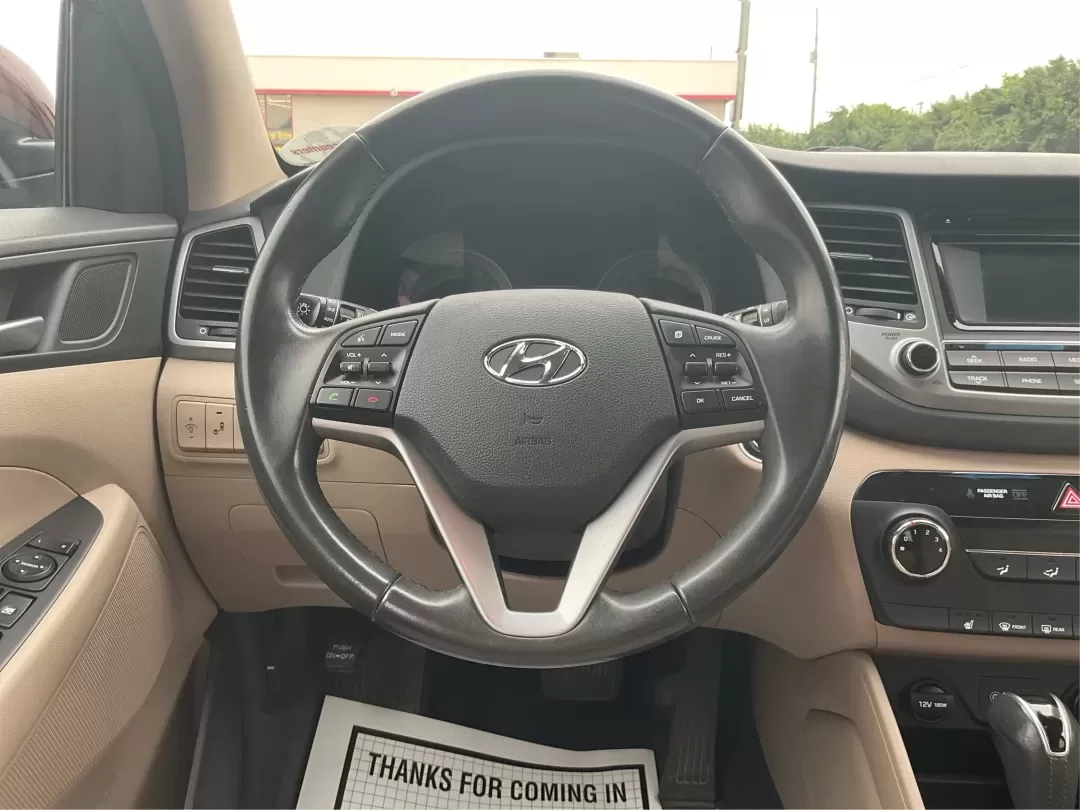 2017 Hyundai Tucson Sport (KM8J3CA29HU) with an 1.6L I-4 gasoline direct injection engine, located at 1951 S Dayton Lakeview Rd., New Carlisle, OH, 45344, (937) 908-9800, 39.890999, -84.050255 - **Discover Adventure in the 2017 Hyundai Tucson: Your Ideal SUV for Every Journey!**<br /> <br /> Are you ready to elevate your driving experience? The 2017 Hyundai Tucson in striking Ruby Wine is here, tailored for those who crave versatility and reliability in their daily adventures. Whether you'r - Photo#16